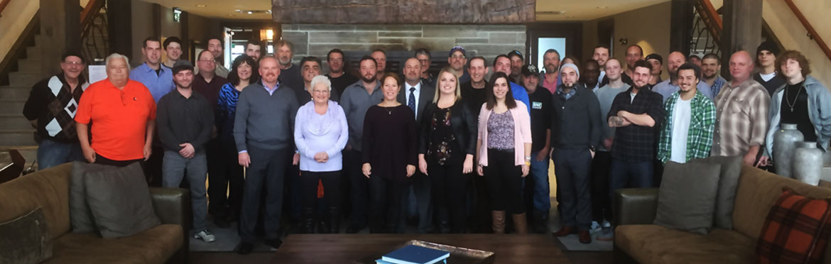 Members of the BNE Concrete Floors team posing together for a team photo